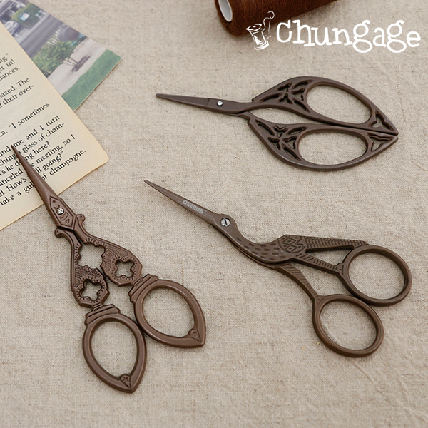 Vintage antique embroidery scissors clover