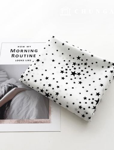 20 count patterned cotton fabric Black Star