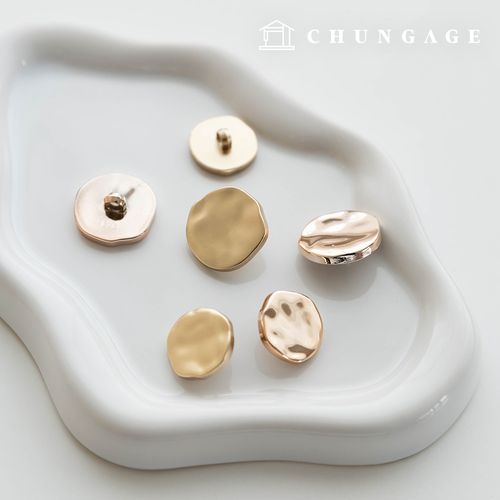 Gold metal Vintage button making