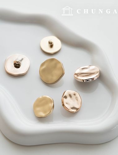 Gold metal Vintage button making